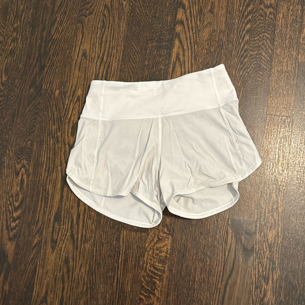 Lululemon white speed it up shorts...longer inseam (4 inch) size 2